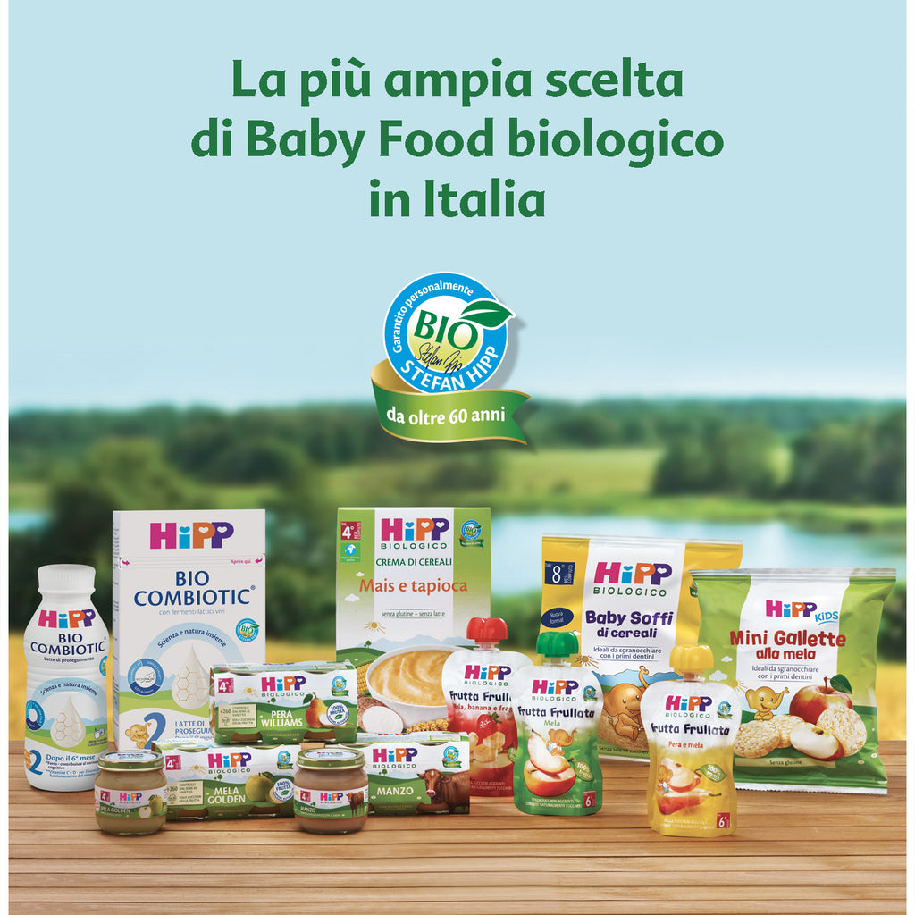 Assortment of HiPP organic baby food products displayed on a wooden surface. 
