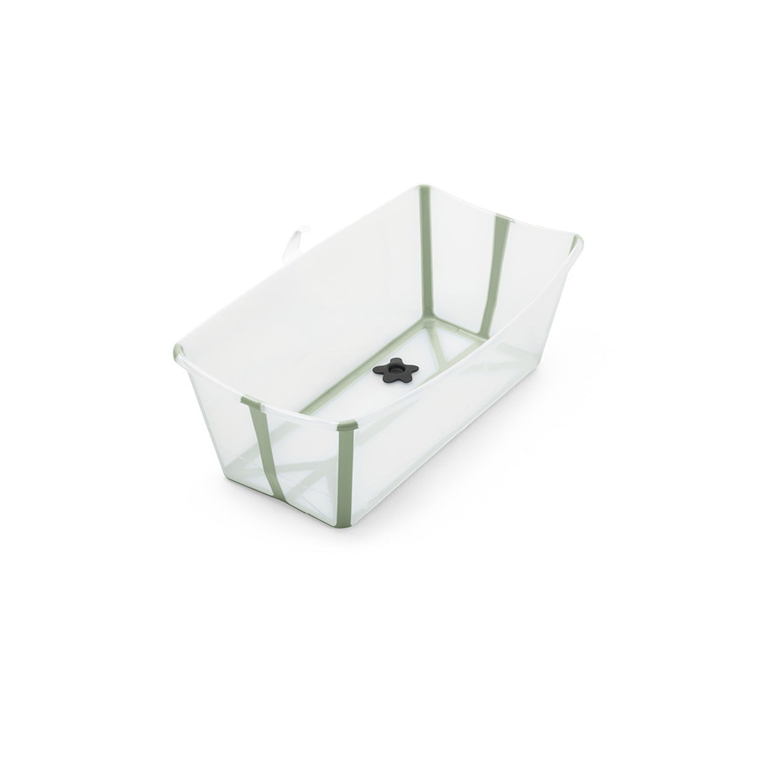 A clear plastic baby bathtub with sage green trim and a black drain plug sits at an angle, ready for bath time. 
