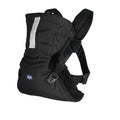 A black Chicco baby carrier with adjustable straps stands ready to secure a baby comfortably and safely. 
